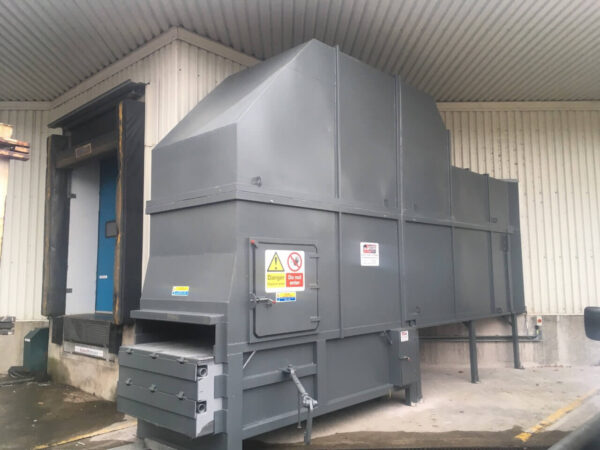 Static Compactor with walk in Hopper System. Loaded inside with Bin Tipper or outside by Hand