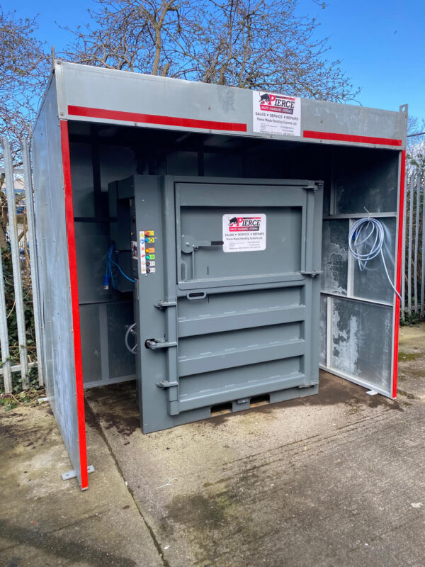 Baler installed outdoors and under cover