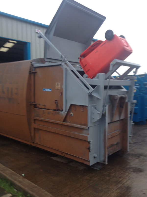 Special Bin Lifts in brown, in motion lifting a bin